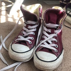 Maroon high-top converse